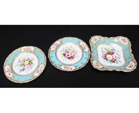 A pair of 19th century porcelain dessert plates and matching square dish in the rococo style, sky-blue rims, gilded highlight