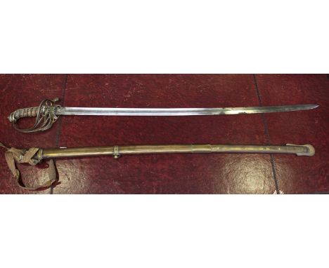 A Victorian army officer's dress sword, 32.5-inch slightly curved fullered blade etched with crowned monogram and arabesque d