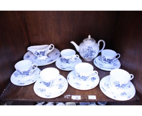 SECTION 50: A 22 piece Royal Worcester 'Blue Sprays' pattern tea service, comprising of plates, cups and a teapot.
