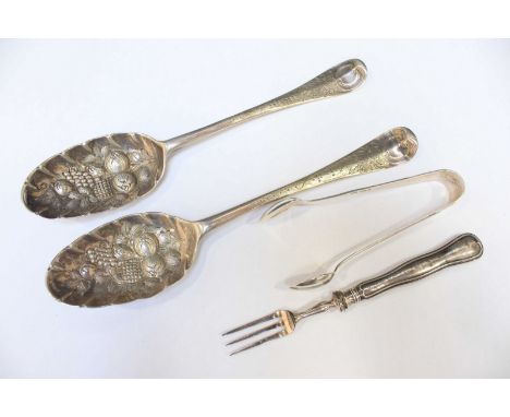 A pair of Georgian silver table spoons converted to Berry spoons, together with a pair of sugar tongs and fork