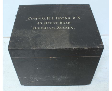 A naval officer's black-painted trunk, inscribed to the top, with carry handles to the side, 61cm wide