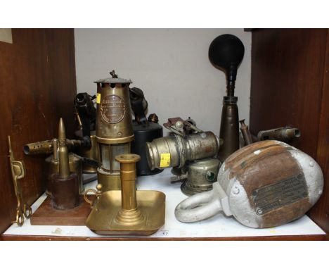 SECTION 17. Five assorted brass blow torches, together with a brass miners lamp, a horn, block, and other items.