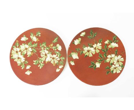 A large pair of Burmantoft's Faience Barbotine wall chargers, model no.315, painted in impasto with simple flowers and foliag