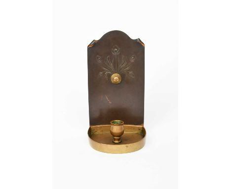 A WAS Benson copper and brass chamber stick designed by George Heywood Sumner, the curved copper backplate stamped with flowe