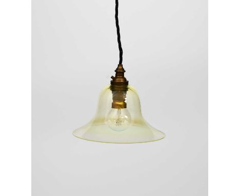 A patinated metal and vaseline glass ceiling pendant light, simple flaring glass shade, with ceiling rose, unsigned 16.5cm. d