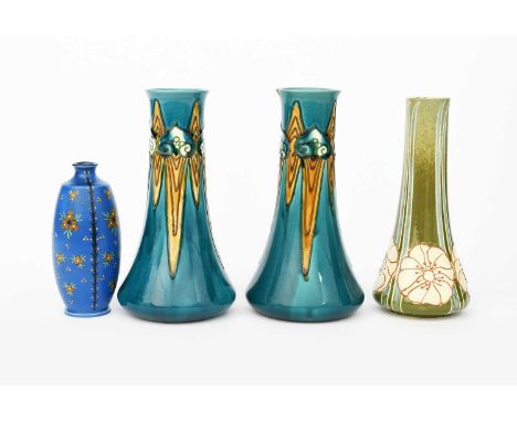A pair of Mintons Pottery Secessionist vases designed by John Wadsworth and Leon Solon, waisted cylindrical form, tubeline de