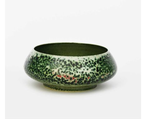 A Ruskin Pottery High-fired stoneware bowl by William Howson-Taylor,  dated 1910, footed form, mottled mint green with sang d