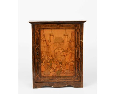 A small pokerwork hanging cabinet, rectangular with hinged door, the door decorated with a scene of the Pied Piper, the sides