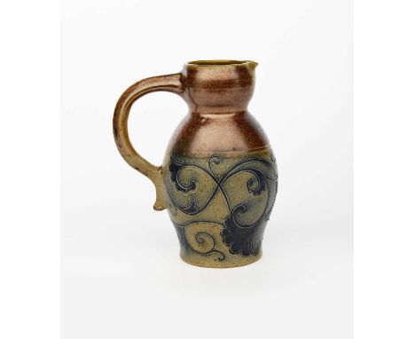 An early Martin Brothers stoneware jug by Robert Wallace Martin, dated 1879, shouldered form, with knopped neck, incised with