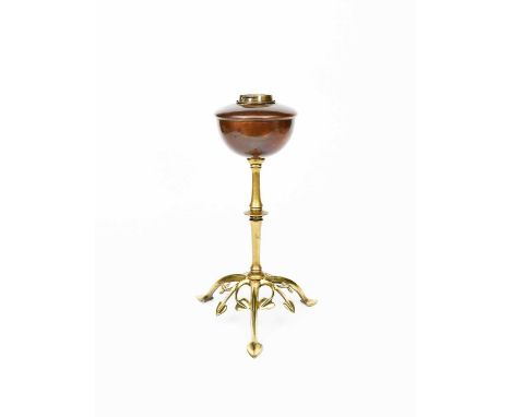 A WAS Benson copper and brass oil lamp, the arched brass tripod foot cast with foliate panels, knopped stem supporting brass 