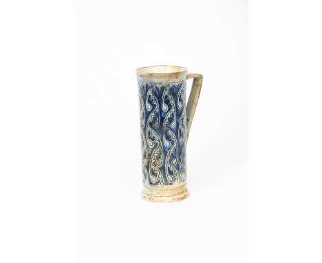 A Martin Brothers stoneware jug by Robert Wallace Martin, dated 1878, cylindrical form, incised with stylised vertical foliat