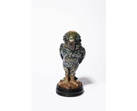 A Martin Brothers stoneware monk bird jar and cover by Robert Wallace Martin, dated 1912, modelled standing, with short broad