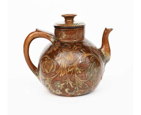 A Martin Brothers stoneware teapot and cover by Robert Wallace Martin, dated 1894, ovoid form, incised with scrolling flowers