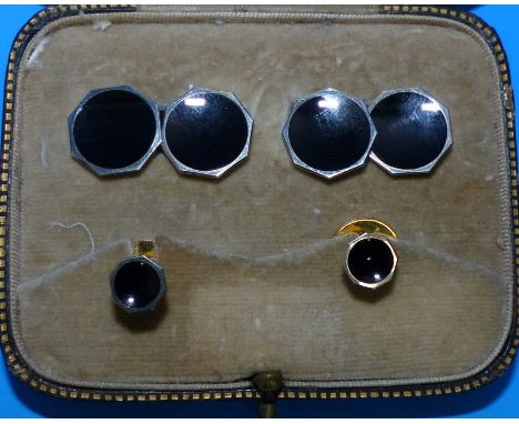 A cased stud and cufflink set, stamped '9CT'; a tie pin