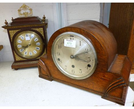 An oak aneroid barometer; an oak chiming mantel clock; a reproduction bracket clock