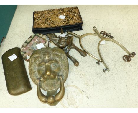 A pair of nickel spurs; a fox door knocker; a lion door knocker; a mother-of-pearl purse and an evening bag; a pair of 19th c