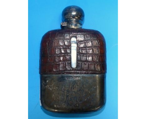 A silver and glass hip flask with detachable cup, Sheffield 1896; a silver cigarette case, Birmingham 1914; a silver top toil