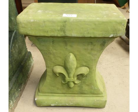 A reconstituted stone garden stand/stool