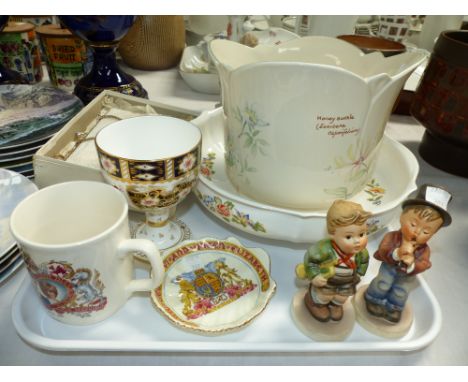 A continental porcelain figural candlestick; a porcelain clock; a quantity of collectors’ plates; etc.