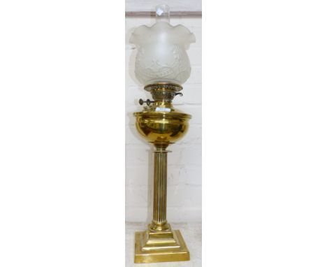 A 19th century reeded brass column oil lamp with frosted shade; 2 brass pig money boxes; a 2 piece brass companion set; etc.