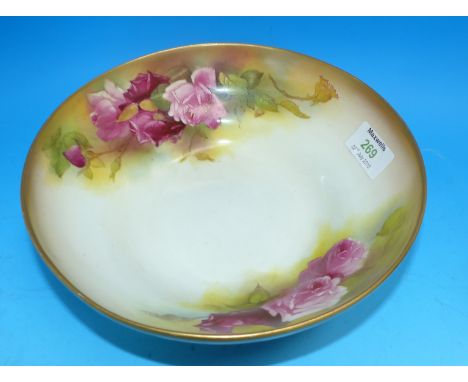 A Royal Worcester circular porcelain fruit bowl decorated with roses, signed M. Hunt, 9" diameter