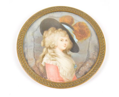 A 19th century circular ivory miniature portrait of a young woman with plumed hat, diameter 7.5cm, framed and glazed.