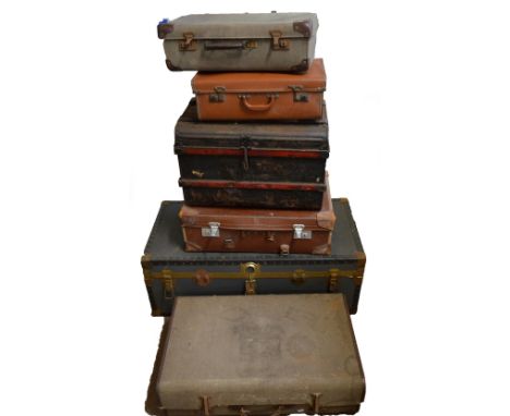 A large metal banded travel trunk, a metal wood bound travel trunk, an 'Over Pond' suitcase and three further suitcases (6).