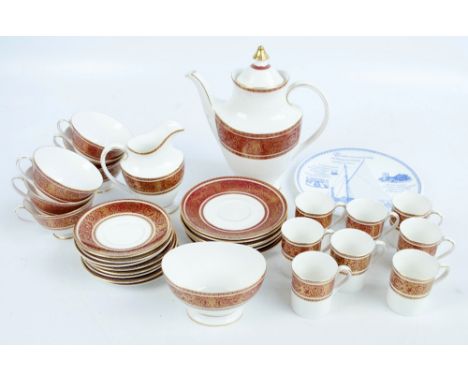 A quantity of Royal Doulton tea wares in Buckingham pattern comprising tea pot, jug and oval bowl, six tea cups and saucers, 