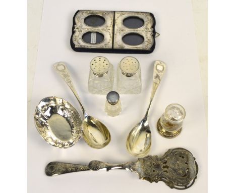 A mixed lot of silver items comprising a pair of post 1888 German spoons, C.F. Gütig, length 19cm, a pair of clear cut glass 