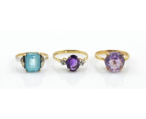 Three 9ct gold dress rings to include two set with amethysts, sizes P½, K½ and K, combined approx 6.8g (3).