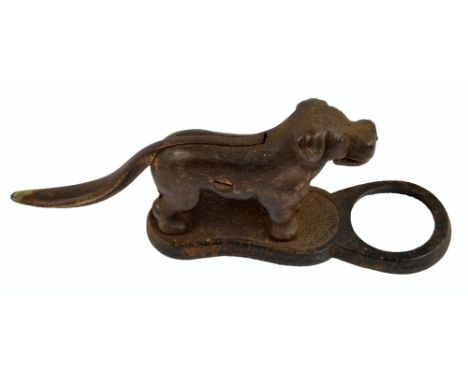 A cast iron dog nutcracker on stand, length 28cm.