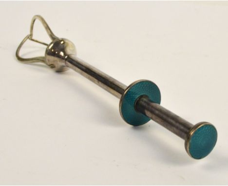 A. SCHARNING; a Norwegian white metal ice tongs with press action guilloche enamel decorated stem and handle, length 15.5cm. 