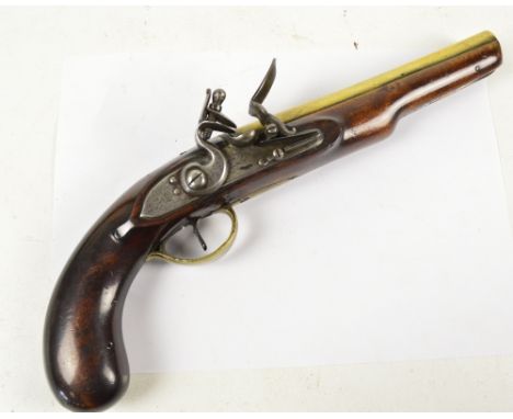 An 18th century brass barrelled flintlock pistol with walnut stock, steel lock and presentation inscription to the barrel 'Gi