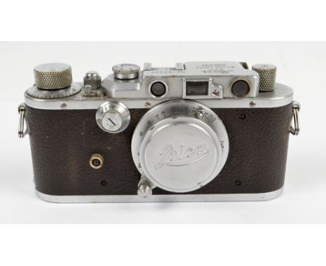 LEICA; a IIIA camera, serial no.193057, 1936, with a Elmar f=5cm 1:3,5 lens, complete with lens cap.