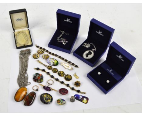 A collection of costume jewellery including Swarovski pendants, a pair of Swarovski earrings, three Satsuma buttons, a Komai 