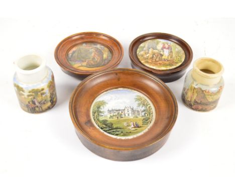 Three framed 19th century Staffordshire Prattware type pot lids depicting a dog, a female with sheep and a mansion inscribed 