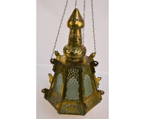 A 20th century Moorish brass glazed hall lantern with pierced foliate and elephant decoration, height approx 66cm.