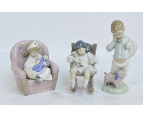 LLADRO; a figure of a girl seated in a rocking chair, a Nao figure of a young girl playing nurse on a chair and a Nao figure 