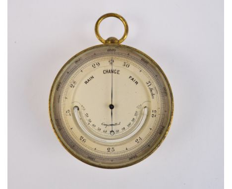 A late 19th century brass cased pocket barometer with silvered dial, thermometer gauge and ring loop attachment, diameter 7cm