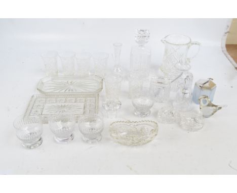 A quantity of mixed cut and moulded glass to include a decanter, a water jug and a Wedgwood model of a bird.