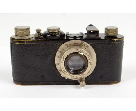 LEICA; a black bodied I camera, serial no.65670, 1931, with Hektor f=5cm.1:2,5 lens.   CONDITION REPORT:  The lens screws out