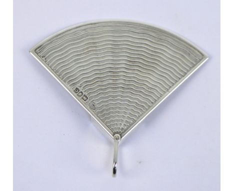 J BATSON & SON; a late Victorian hallmarked silver fan shaped item with swivelling suspension ring, and waving engine turning
