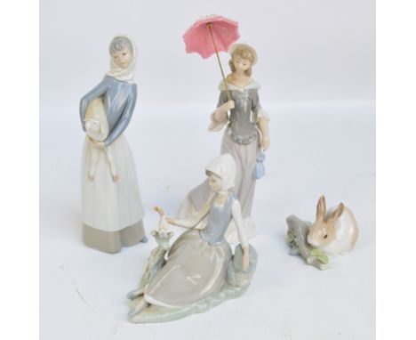 LLADRO; four figures; A girl with a parasol, a girl with a lamb, a seated girl with a bird, and a rabbit, all marked to base 