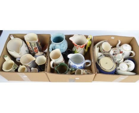 Three boxes of assorted ceramics including fourteen assorted jugs, Crown Staffordshire tea for two, various Wedgwood items, a