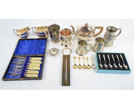 A mixed lot of plated items including three piece tea service, cased set of fish knives and forks, various spoons including c