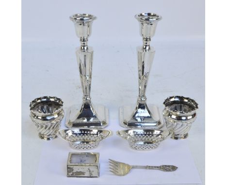 A pair of late Victorian hallmarked silver vases with wrythen moulded decoration, Birmingham 1891, a pair of Chester hallmark