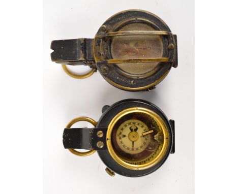 J.H. STEWARD LTD, 406, STRAND, LONDON; a leather cased black painted and brass bodied pocket compass, a further similar unnam