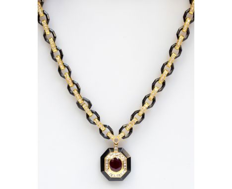 VAN CLEEF & ARPELS; an 18ct gold 'black platinum' ruby and diamond necklace, the openwork linked chain set with diamonds to e