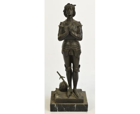 A late 19th/early 20th century French bronze statue of Joan of Arc praying, on rectangular base and marble plinth, bearing si