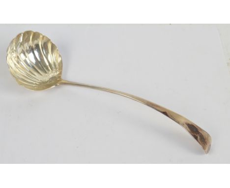 An early 19th century provincial silver Old English pattern ladle with scallop moulded bowl, initialled 'KV' to the finial, m
